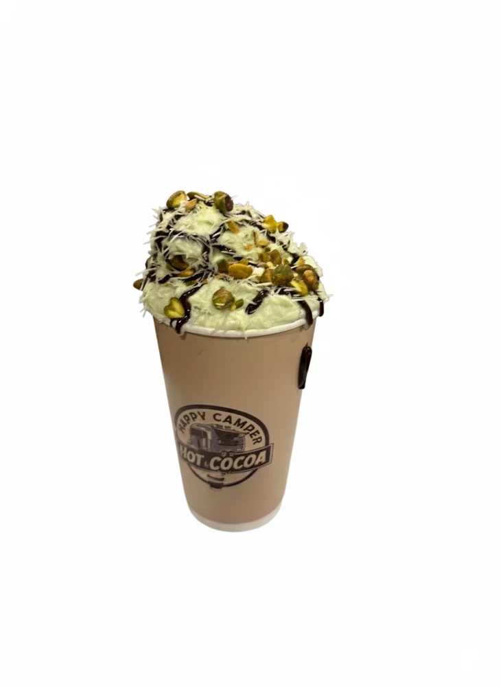Dubai Chocolate hot cocoa piled high with pistachios, chocolate drizzle, and crisp strands